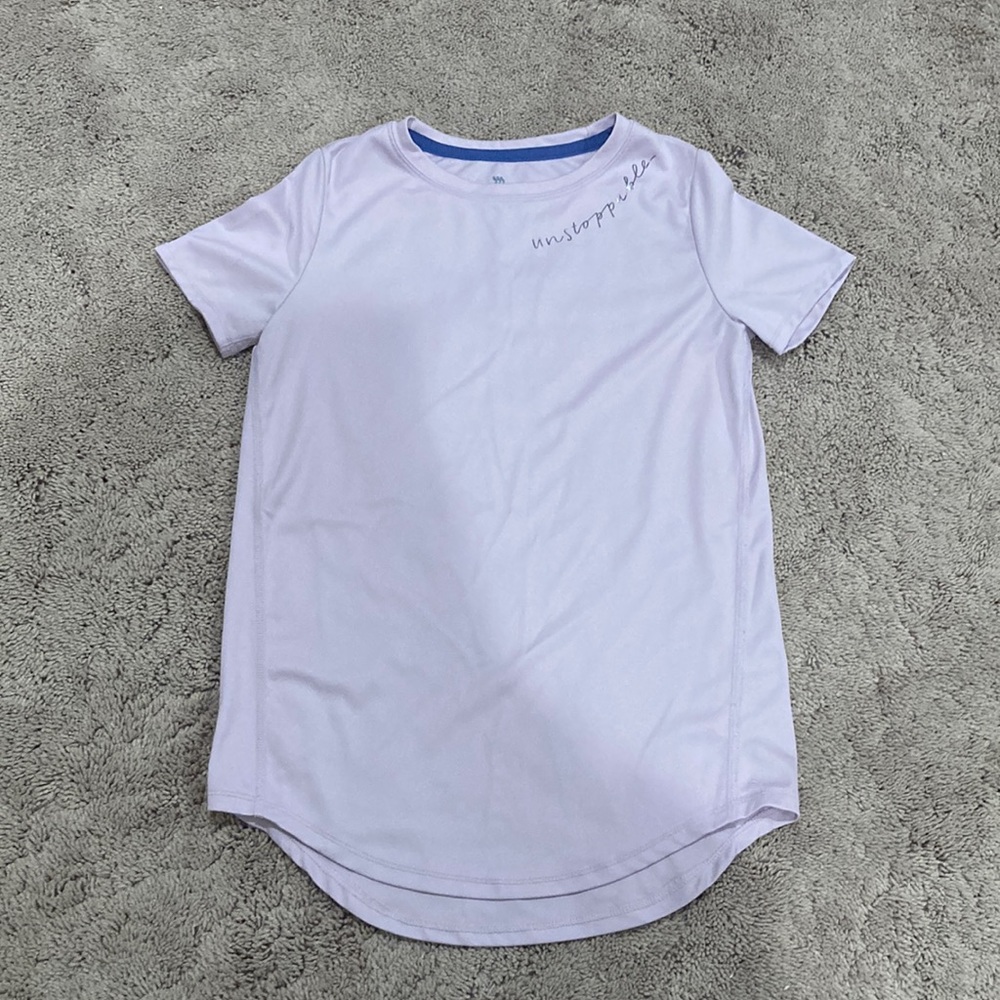 Light purple girls athletic shirt that says Unstoppable